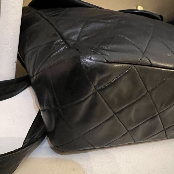 CHANEL Black Quilted Backpack with Gold Logo - Picture 9 of 16